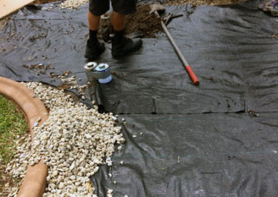 Laying fabric and stone